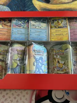 Pokemon Prismatic Evolutions Mini Tin 8-Pack With Promo Cards Costco - Image 3