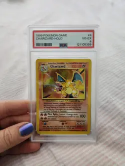 1999 POKEMON GAME #4 CHARIZARD-HOLO PSA4 - Image 1