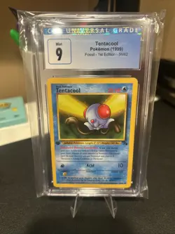 1999 Pokemon Fossil Tentacool 1st Edition CGC 9 Old Label Card Mint Slab - Image 1