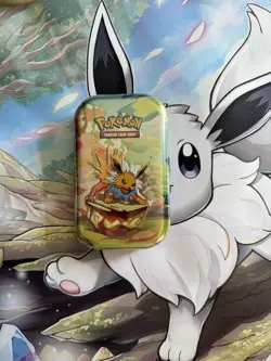 Pokemon TCG Prismatic Evolutions Mini Tin - Factory Sealed (Random Tin) - Image 4