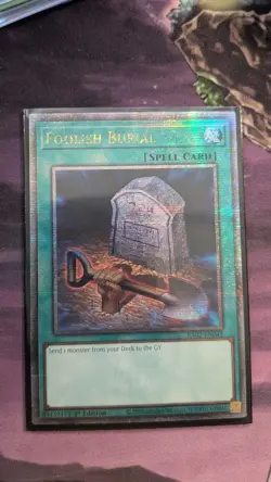 Yugioh Foolish Burial - RA02-EN049 - Quarter Century Secret Rare - 1st Ed NM - Image 1