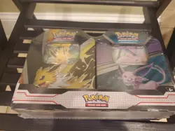 Pokemon Trading Card Game: Jolteon Espeon Tin Bundle 820650855658 - Image 5
