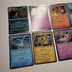 Pokemon TCG Prismatic Evolutions Costco Mini Tin Cosmos Promo Cards Set Of 8 NM - Image 3