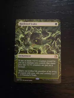 Hardened Scales - Wilds of Eldraine: Enchanting Tales - 0060 Regular - Image 1