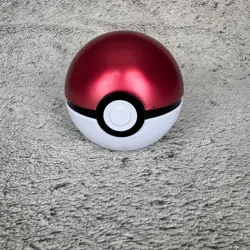 Pokemon Trading Card Game Pokeball Tin Including 50 Random Pokemon Cards - Image 1