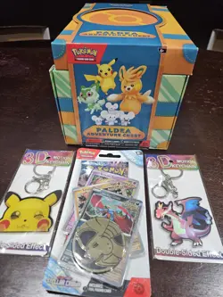 POKEMON PALDEA ADVENTURE CHEST , 1 SEALED TRADING CARD PACK & 2 KEY CHAINS * - Image 1