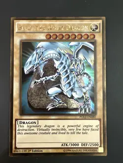 YUGIOH BLUE-EYES WHITE DRAGON PGL2-EN080 1ST GOLD NM - Image 1