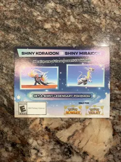 Shiny Koraidon or Miraidon Pokemon Scarlet Violet Code Card - Gamestop - Image 1