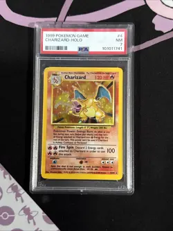 Pokemon TCG Unlimited Charizard Holo-Rare Card 04/102 Base Set PSA 7 - Image 1