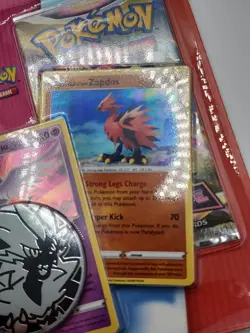 Pokemon TCG: Moltres, Articuno & Zapdos Cards with 2 Booster Packs & Coin - Image 4