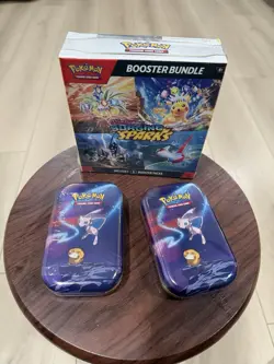 Pokemon Surging Sparks Booster Bundle TCG 6 packs sealed , + 2 tins from 2019 🔥 - Image 1
