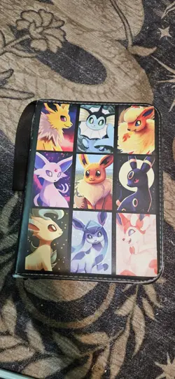 Pokemon Eeveelutions themed binder, comes with cards including 2 hypers rares - Image 1