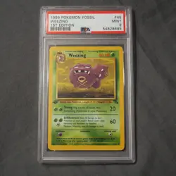 1999 POKEMON FOSSIL 1ST EDITION #45 WEEZING PSA 9 MINT - Image 1