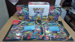 POKEMON MEGA (2) BLISTER + (2) PALDEAN FATES BUNDLE + SURGING SPARKS BOOSTER BOX - Image 1