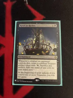 Revel in Riches - Ixalan - The List Reprints - NM - Image 1