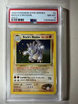 2000 POKEMON GYM HEROES HOLO #2 BROCK'S RHYDON PSA 8 - Image 1
