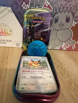 Umbreon Prismatic Evolutions Pokemon Mystery Mini Tin -Eevee Card + Cards + Coin - Image 1