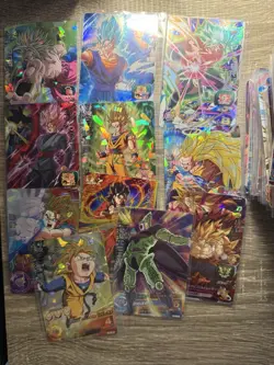 Stack Of 2 And 3 Star Super Dragon Ball Heroes Cards - Image 1