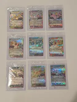Prismatic Evolutions Surprise Box Sealed Stamped EX Promo Cards Complete Set 9/9 - Image 1