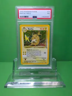POKEMON 1999 FOSSIL RAICHU HOLO 14/62 PSA 7 - Image 1