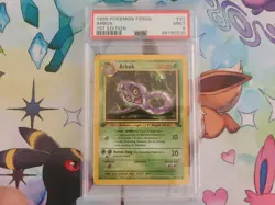 1999 Pokemon Fossil 1st Edition Arbok 31/62 - PSA 9 Mint - Image 1