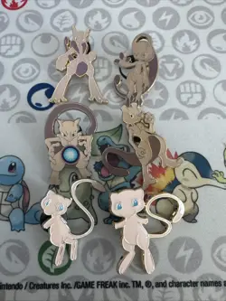 Pokemon Official 6 Pin Set - Mega Mewtwo X + Mega Mewtwo Y Blister Pack Pins Mew - Image 1