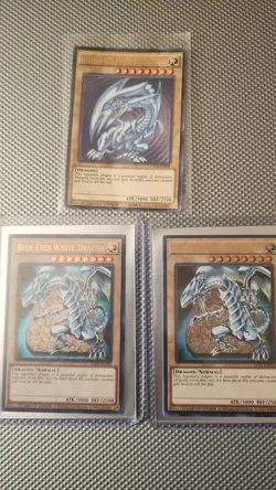 3 Blue Eyes White Dragon YUGIOH Cards - Image 1
