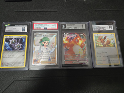 Pokemon Graded Card Lot - Charizard VMAX, Roseanne’s Backup, Eevee, Klink - Image 1