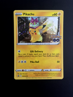 Pokemon PIKACHU SWSH234 POKEMON GO HOLO BLACK STAR PROMO NM/M - Image 1