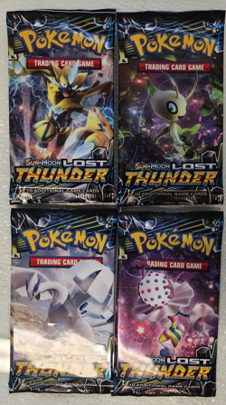 POKEMON SEALED SUN & MOON LOST THUNDER BOOSTER PACKS ART WORK SET (4) UNOPENED - Image 1