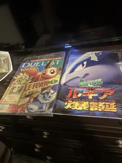 Pokemon TCG Collectible Magazines With Pikachu Stamped Card And Ancient Mewtwo - Image 1