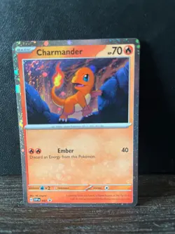 Charmander - 047 (Cosmos Holo) 047 Sv: Scarlet & Violet Promo Cards Holo SWIRL - Image 1