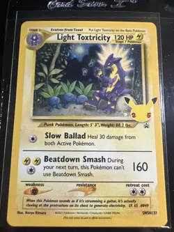 Light Toxtricity SWSH137 Pokemon Celebrations 25th Anniversary Black Star Promo - Image 1