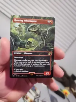 Magic the Gathering NM Hunting Velociraptor (Borderless) Jurassic World - Image 1