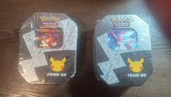 Pokemon 25th Anniversary Celebrations Tin Set: Lance's Charizard & Dark Sylveon - Image 1