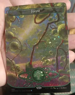 Forest (490) (Borderless) (Galaxy Foil) Unfinity Foil - Image 1