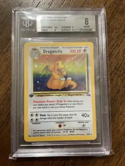 1999 POKEMON FOSSIL #4 DRAGONITE-HOLO BGS 8 - Image 1