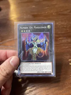 Number 104: Masquerade Super Rare OP27-EN010 Yugioh - Image 1