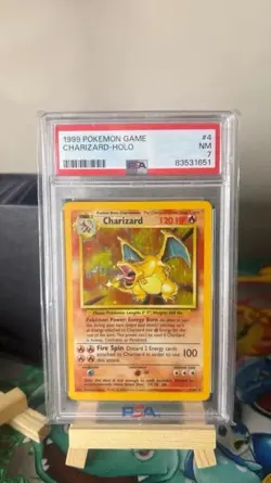 1999 Pokemon Base Set Charizard - Holo (4/102) Graded PSA 7 - NM - Image 1