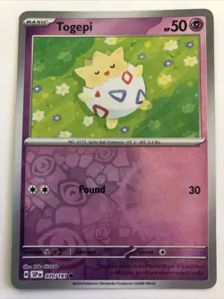 Pokemon TCG Surging Sparks Togepi Reverse Holofoil 070/191 NM - Image 1