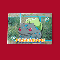 BULBASAUR (FUSHIGIDANE)--JAPANESE MEIJI EMBOSSED PROMO FOIL POKEMON CARD - Image 1