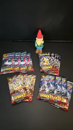Lot of 16 EMPTY Surging Sparks Packs - No Cards, Just Wrappers - Image 1