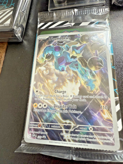 Pokemon Black Bolt ETB Thundurus prom, dice, 65 card sleeves, coins & 45 energys - Image 2