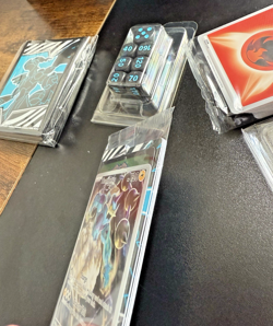 Pokemon Black Bolt ETB Thundurus prom, dice, 65 card sleeves, coins & 45 energys - Image 5