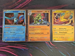 Team Rocket’s Zapdos 70 Articuno 51 Tyranitar 96 Cosmos Promo Set Pokemon TCG - Image 1