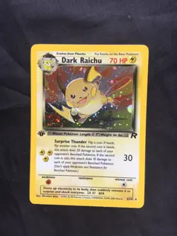 Pokemon Cards: Team Rocket 1st Edition Rare Holo: Dark Raichu 83/82 - Image 1