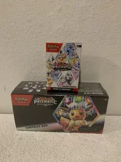 POKEMON TCG PRISMATIC EVOLUTIONS SURPRISE BOX WITH BOOSTER BUNDLE - Image 1