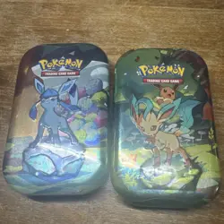 FACTORY SEALED - Pokemon TCG Prismatic Evolutions Mini Tins (lot of 2) - Image 1