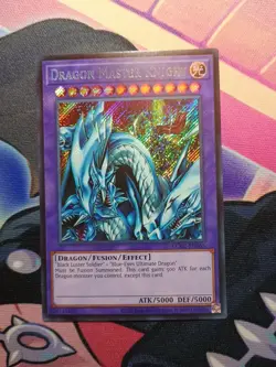 Yu-Gi-Oh! TCG Dragon Master Knight LCKC-EN065 Secret Rare Holo Bleed Near Mint - Image 1