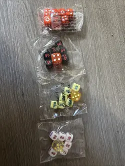 4 Pokemon Dice Sets of 7- New in Bags - Image 1